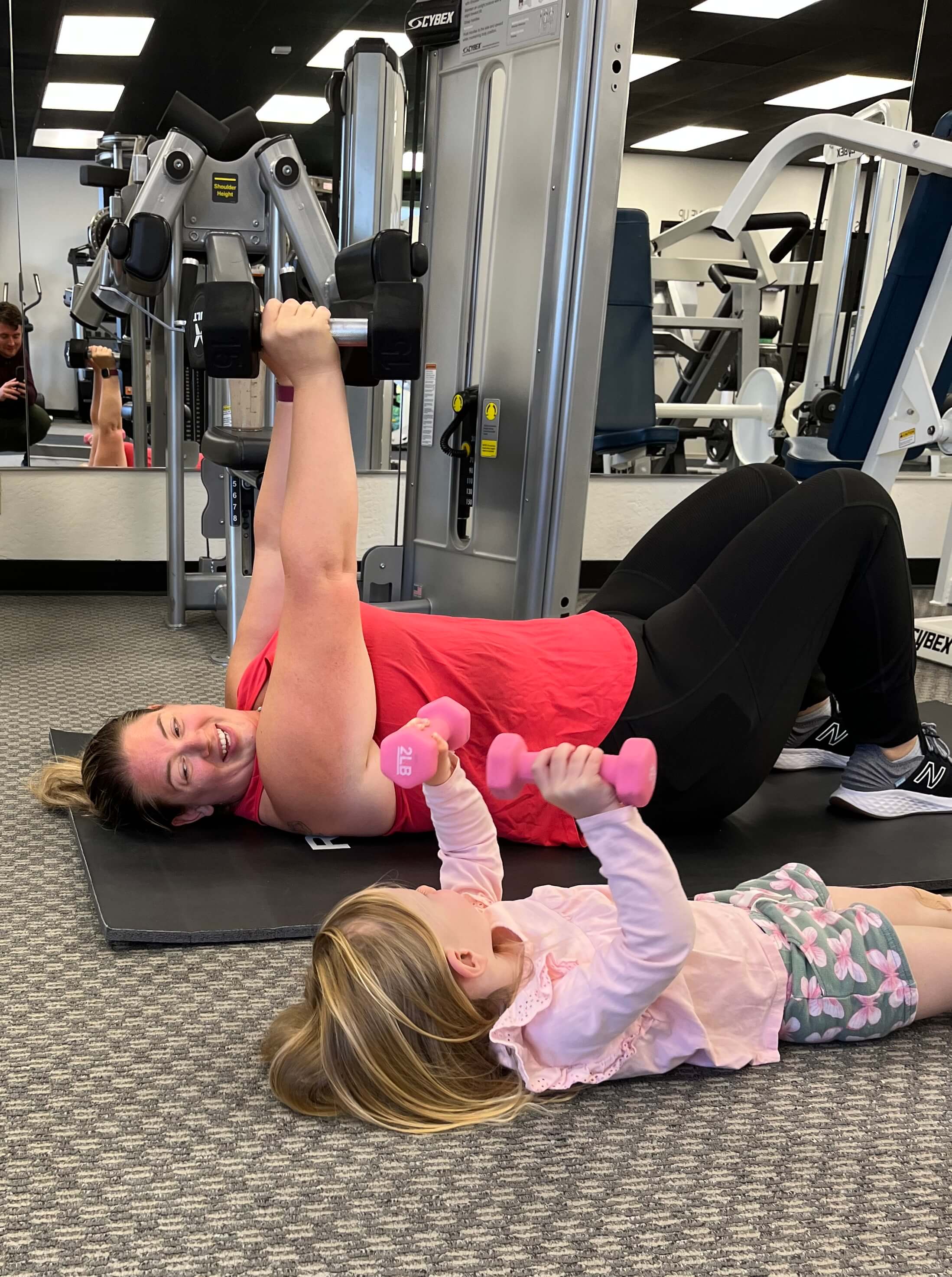 Mother and daughter personal training session.